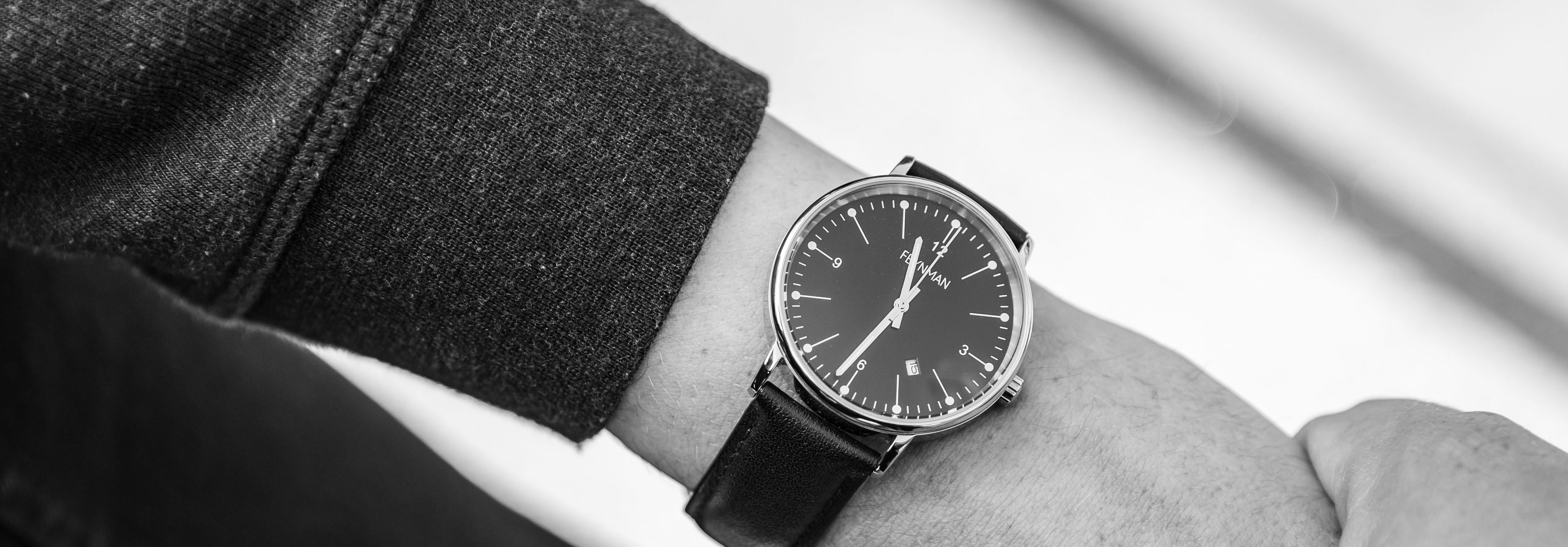 Photo of a hand wearing a Feynman CWII watch